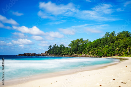 beautiful paradise tropical beach palms rocks white sand turquoise water  seychelles 3