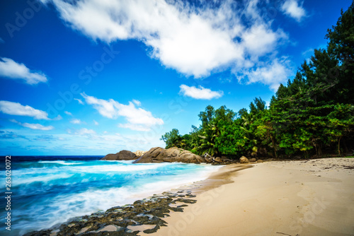 beautiful tropical beach with palms,granite rocks and turquoise water, seychelles 1