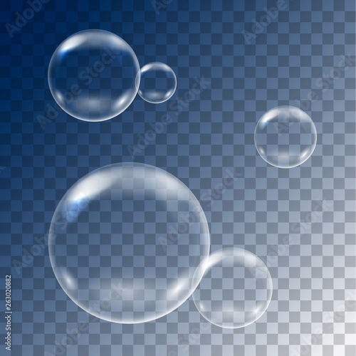 Realistic illustration of set of flying soap bubbles on transparent blue background, vector photo