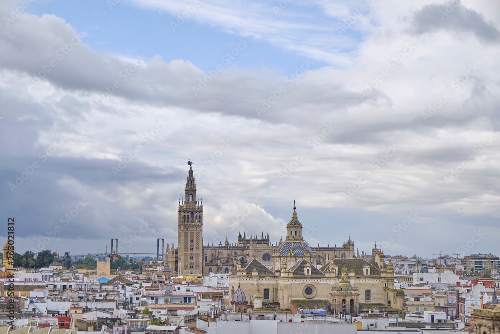 April 2019 - Seville SPAIN - Skyline of the city (capital of Andalusia) from the observation deck (Metropol Parasol) in a cloudy day.