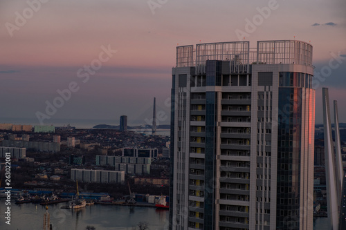 Wallpaper Mural Panoramic view of the city of Vladivostok against the sunset. Torontodigital.ca