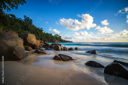 sunset in paradise.shadows of rocks tropical beach anse intendance seychelles 5