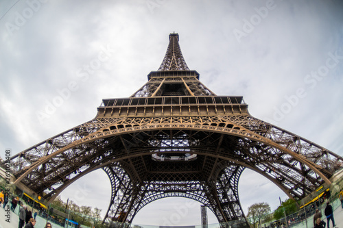 Paris, France, 2019: Eiffel Tower in sunny spring day in Paris, France
