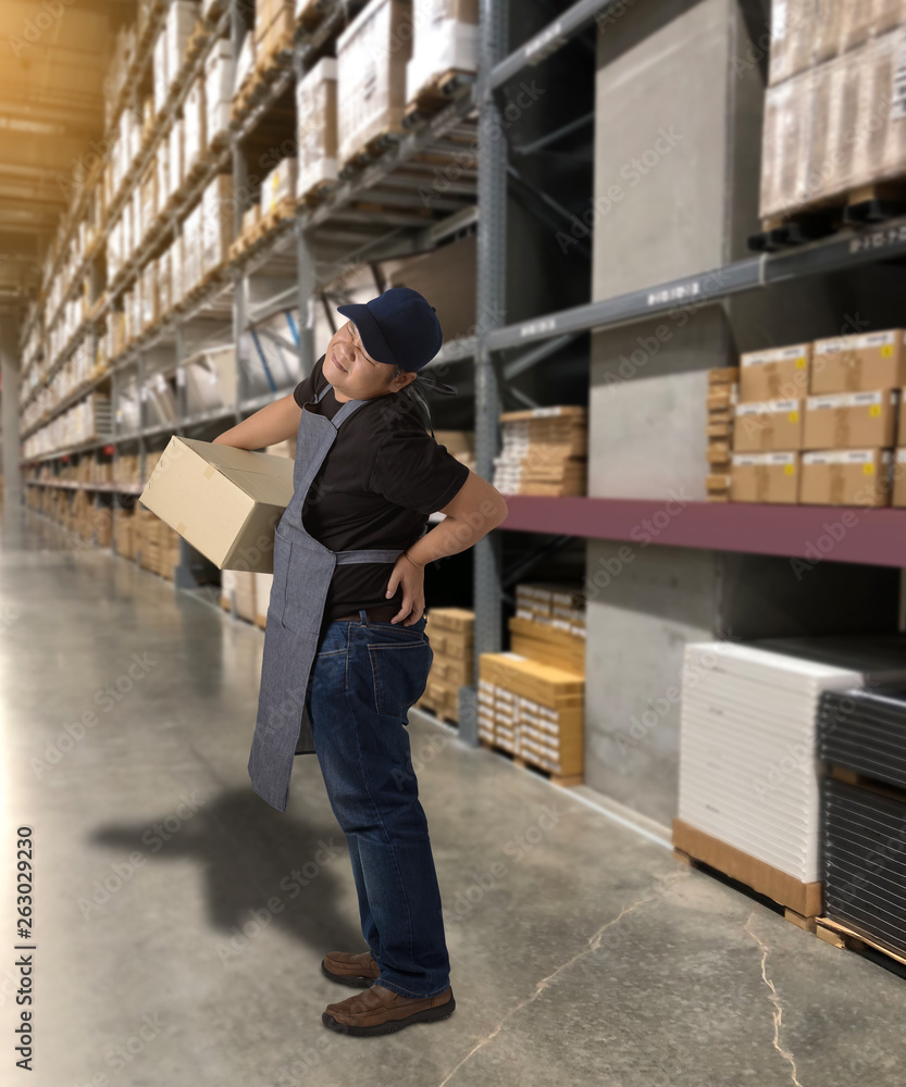 Worker with holding parcel boxes having a backache