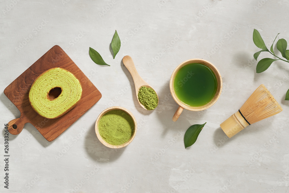 Green matcha Baumkuchen Japanese roll cakes with matcha, selective focus Green matcha Baumkuchen Japanese roll cakes with matcha, selective focus