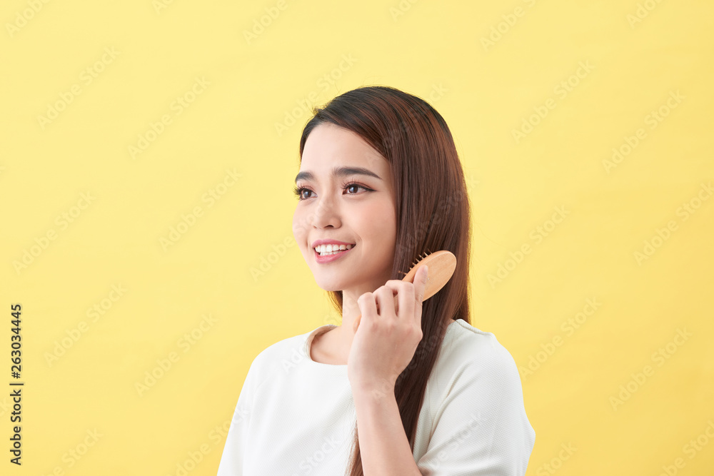 Concept of healthy good hair. Pretty beautiful charming woman with beaming smile Concept of healthy good hair. Pretty beautiful charming woman with beaming smile