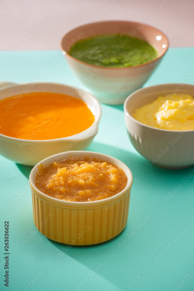 Homemade vegetable baby food purees in glass jars Homemade vegetable baby food purees in glass jars