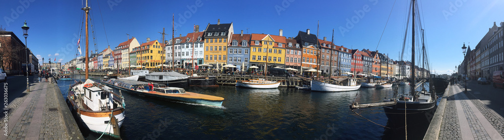 Vacation in Europe. Colored houses near the water channel. Copenhagen.