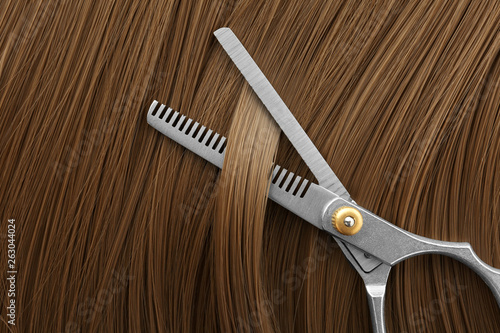 Thinning scissors on light brown hair, top view. Hairdresser service