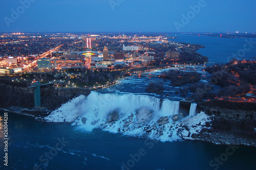 Aerial View of American Falls of Niagara Falls at night in winter, New York State, USA.