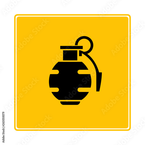 grenade on yellow background