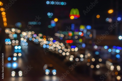 Lights blurred lights of cars on the road used as a background.