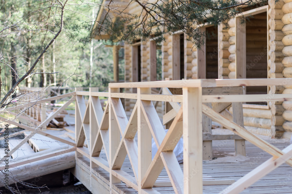 Obraz premium building a wooden house