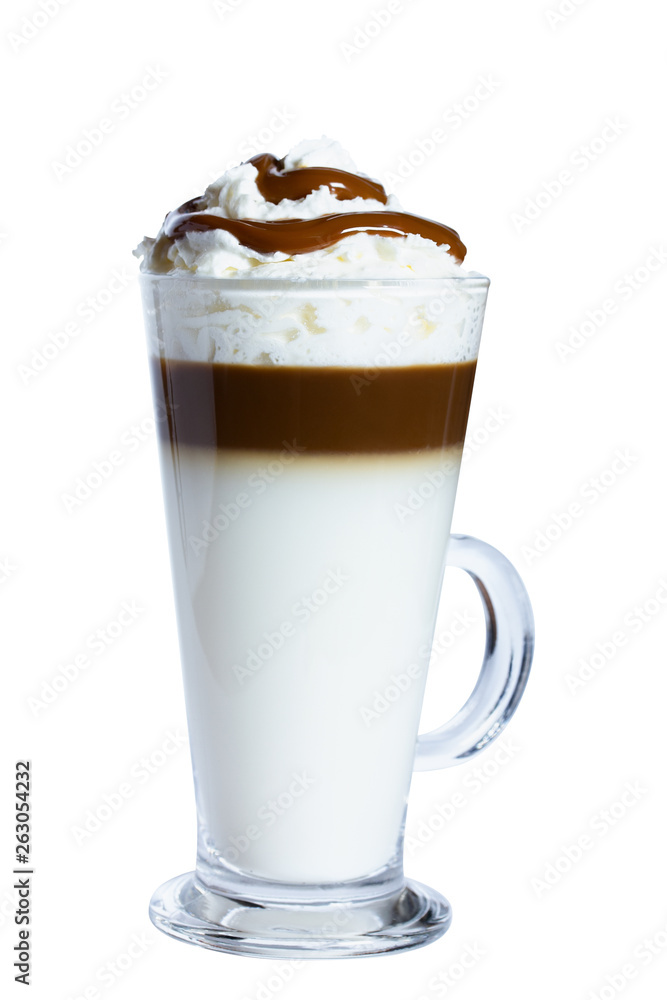 Coffee macchiato with whipped cream and caramel in a glass mug. Isolated object on white background. The photo. Coffee macchiato with whipped cream and caramel in a glass mug. Isolated object on white background. The photo.