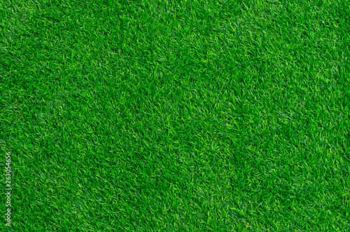 Artificial green grass texture background. Top view photo. © Nudphon