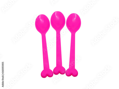 Pink color spoon fork dish plastic isolated white background © Mahdeaw_Spartans