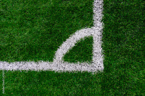 Artificial turf soccer field with corner marker line.