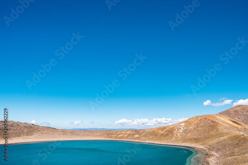 Beautiful Landscape view of Tongariro Crossing track on a beautiful day with blue sky, North Island, New Zealand.