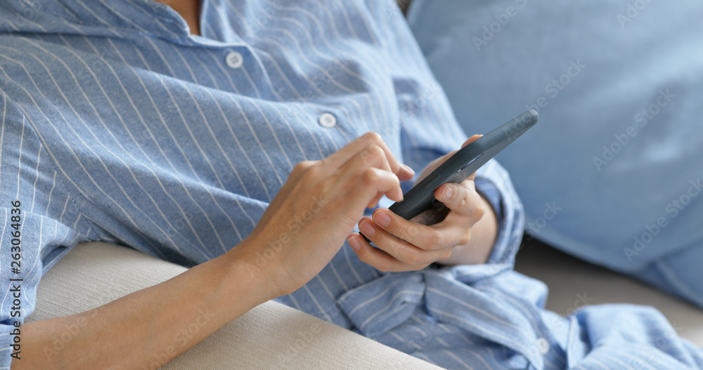 Woman use mobile phone for online