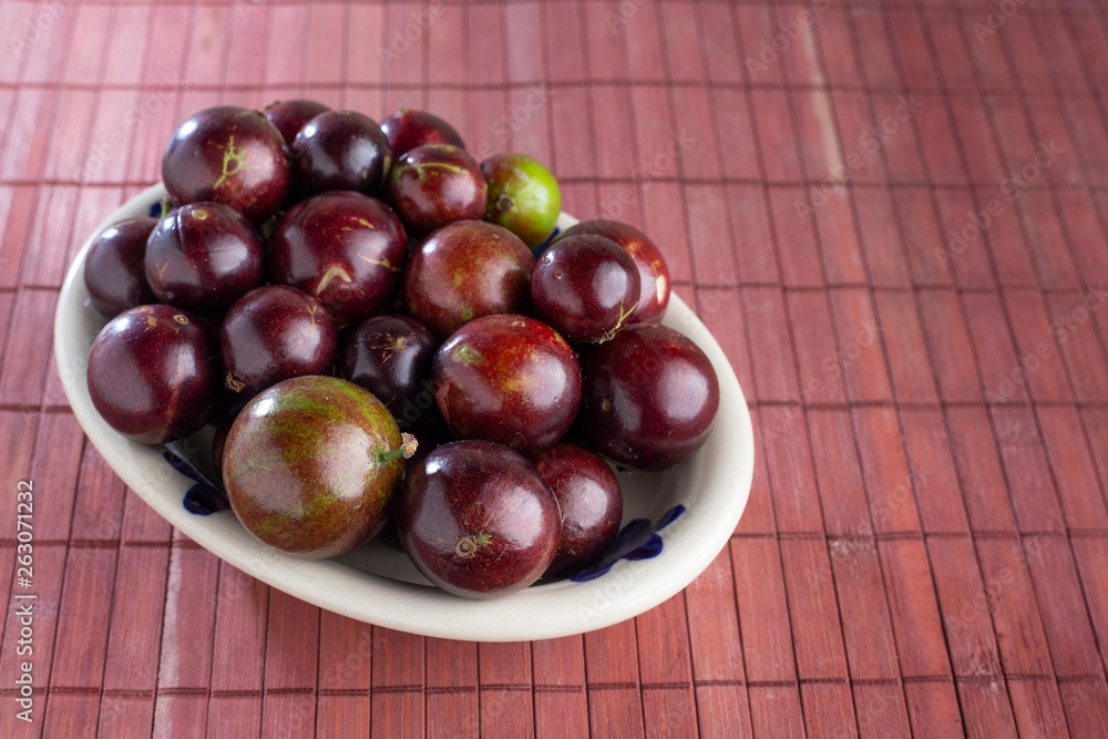 fruits of jaboticaba in bowl on the table fruits of jaboticaba in bowl on the table