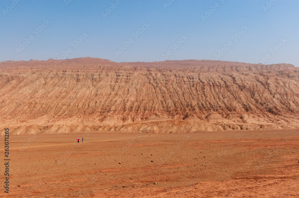 The arid landscape at the Flaming Mountains near the city of Turpan, Xinjiang, China The arid landscape at the Flaming Mountains near the city of Turpan, Xinjiang, China