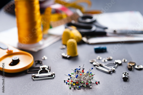 sewing tools on dark background