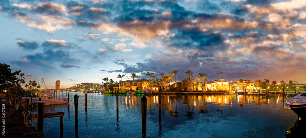 Lake Boca Raton and city skyline with reflections at sunset, panoramic view