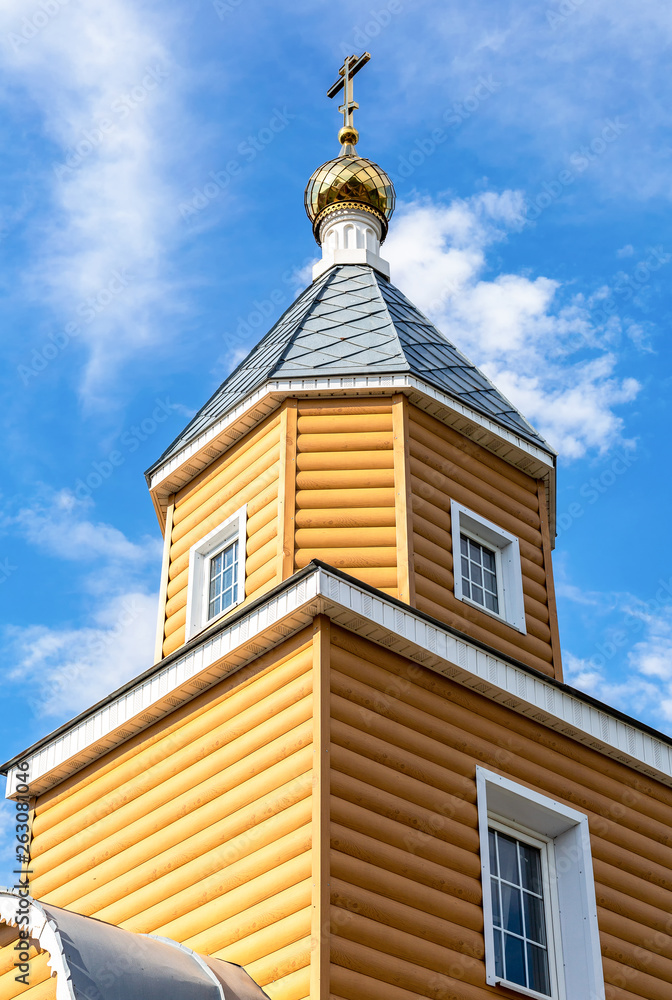 Wooden orthodox church against the sky
