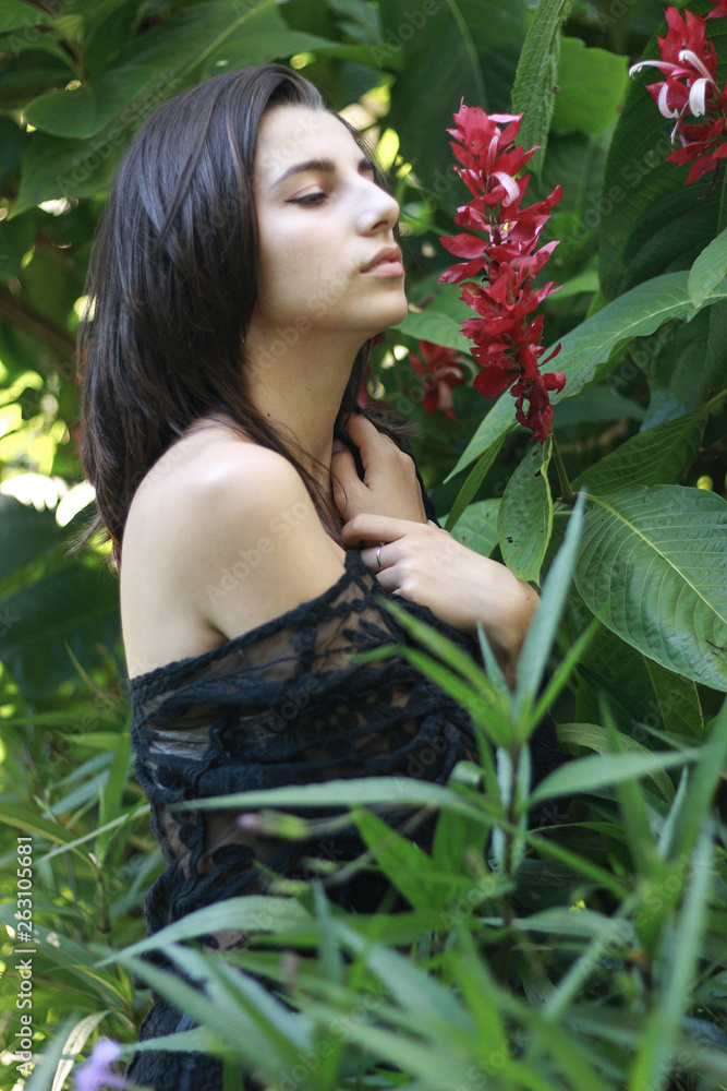 Sexy young brunette beauty in a rain forest Sexy young brunette beauty in a rain forest