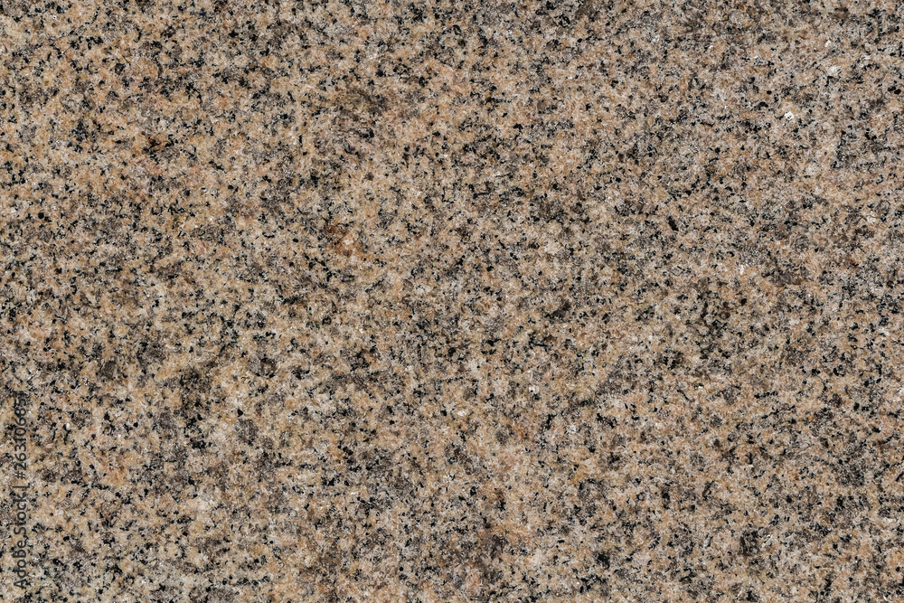 A beautiful texture of natural gray and yellow granite stone surface in the photo A beautiful texture of natural gray and yellow granite stone surface in the photo