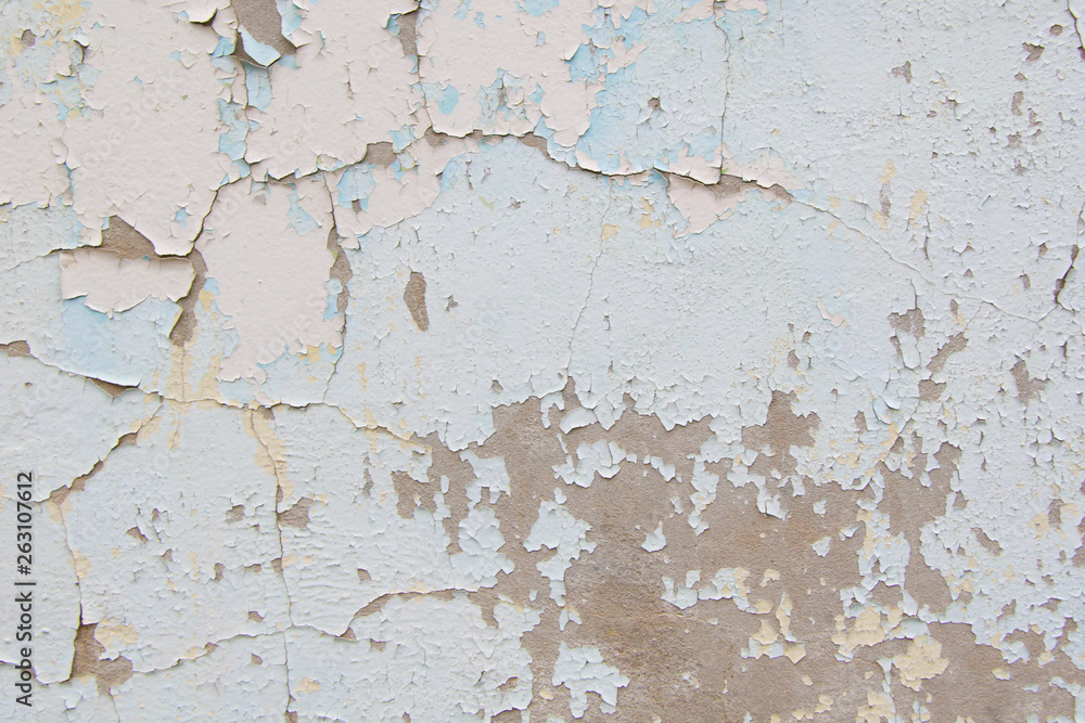 Obraz premium Old cement wall with cracked blue paint texture