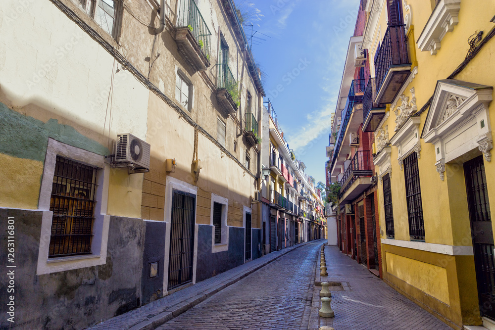Colorful buildings in street in Seville, Spain