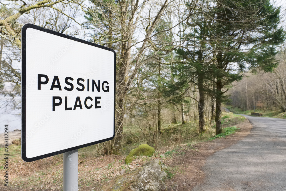 Passing place road sign post wilderness rural countryside safety danger caution Scotland uk