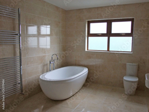 Large bath in bathroom