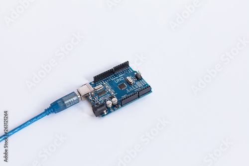 TERNOPIL, UKRAINE - APRIL 19, 2019: Arduino Uno. Micro controller. Technology. Development platform connected to PC with a USB cable. Electronic computing machine. Concept. High intelligence.
