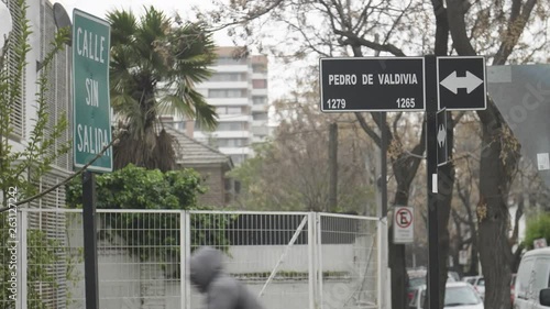 Santiago Chile Downtown Man Walking Down Past Street Corner Pedro De Valdivia photo