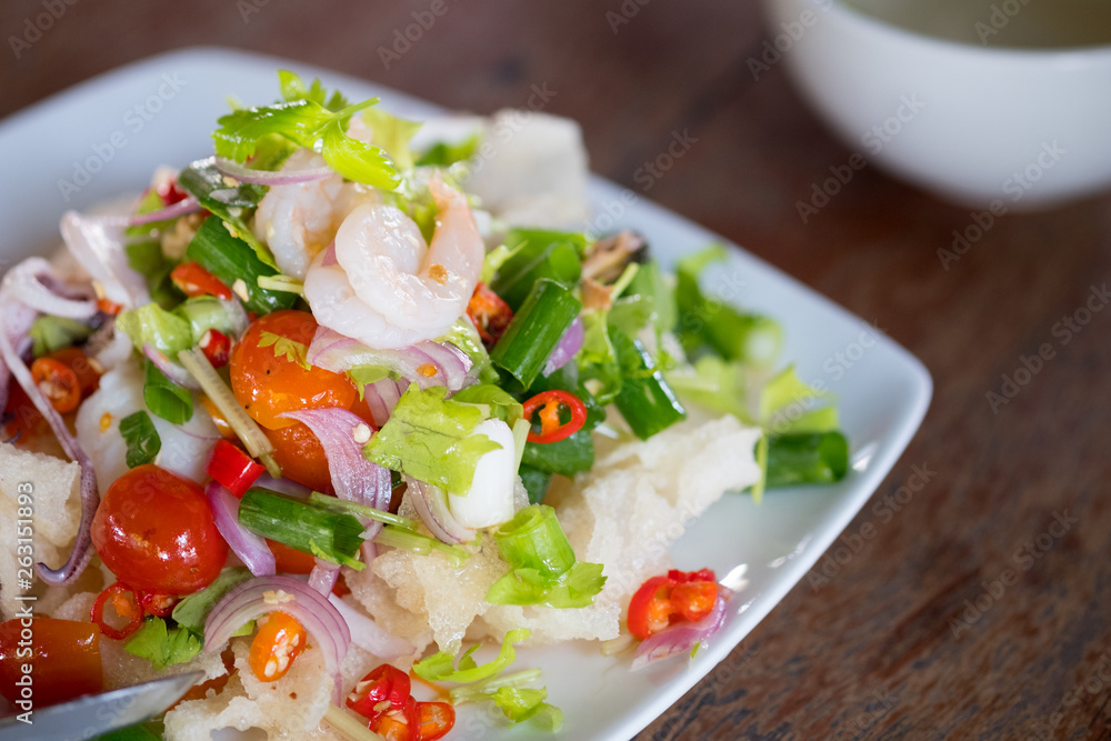 Spicy salad seafood with squid shrimp salad Spicy salad seafood with squid shrimp salad