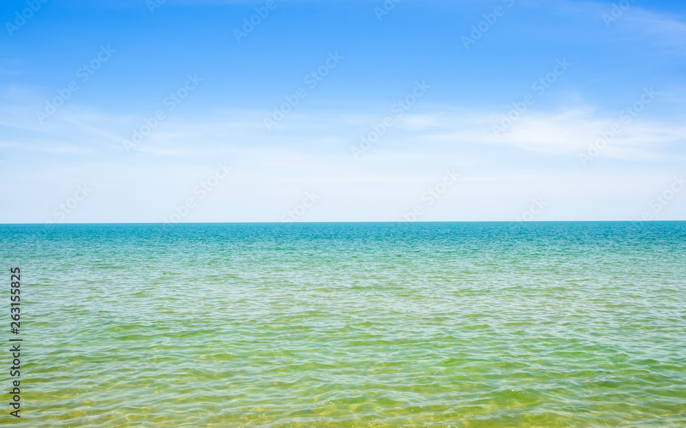 Abstract beach background. Yellow sand, blue sky