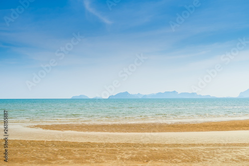 Abstract beach background. Yellow sand, blue sky