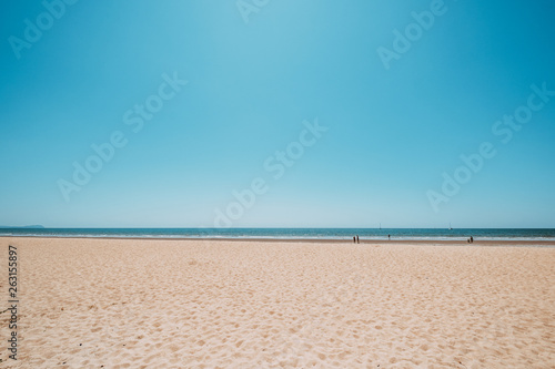 Seascape of beautiful tropical beach with calm sky. sea view and sand beach, summer background. photo