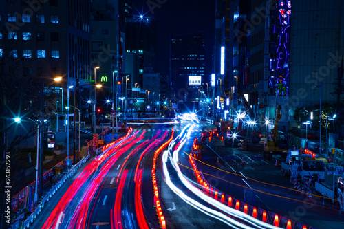 Night time lapse urban street at the business town in Tokyo photo