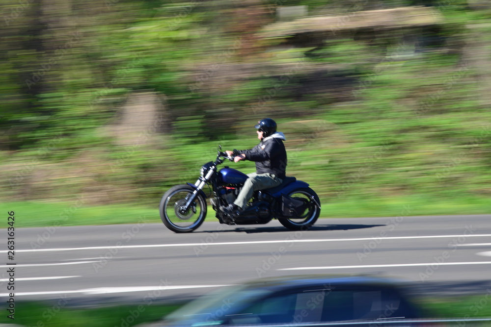 european bikers on their bikes on a sunny day with blurred background