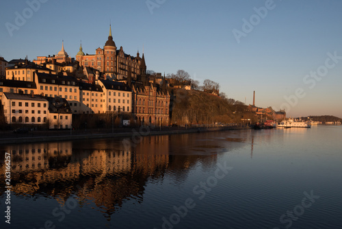 View over old houses in the Södermalm district a spring day at sunrise in Stockholm from the Riddarholmen island