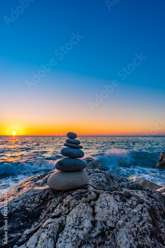 Photography Stacked stones at the beach