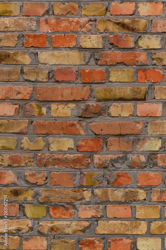 yellow with red grunge brick wall background