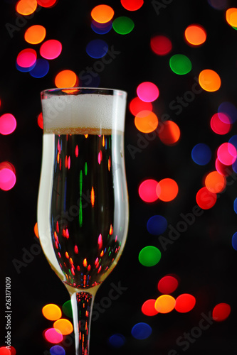 glasses of champagne on background of lights