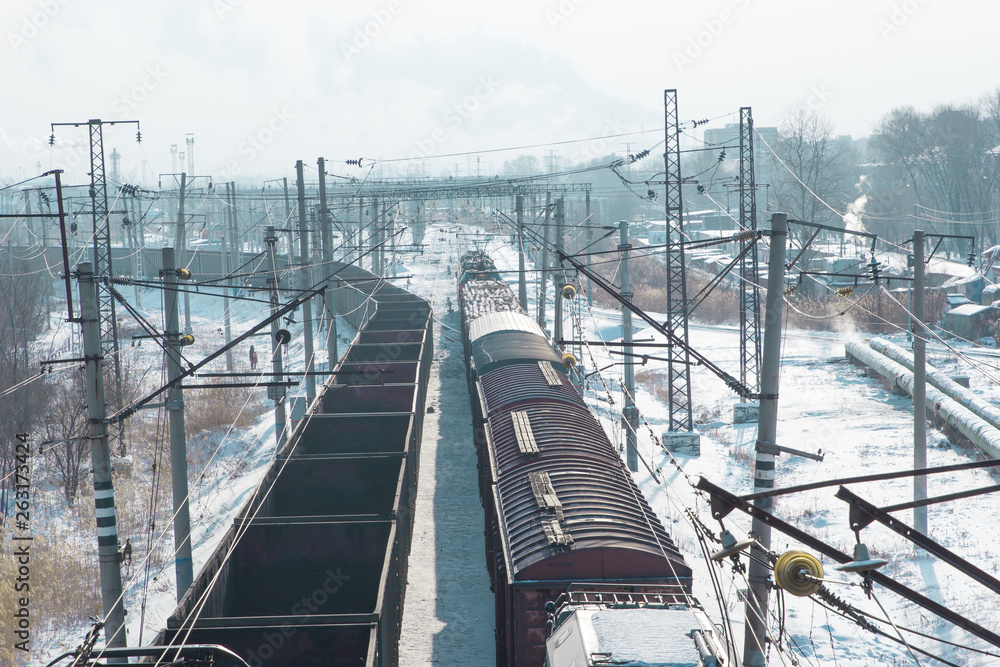 rail cars loaded with coal being transported from nearby mines to power plants in winter