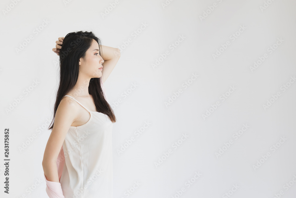Sexy woman in pajamas posing in seductive mood.. Sexy woman in pajamas posing in seductive mood..