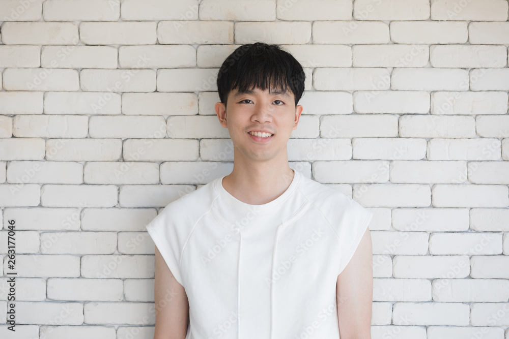 Sexy Asian model man standing and posing..