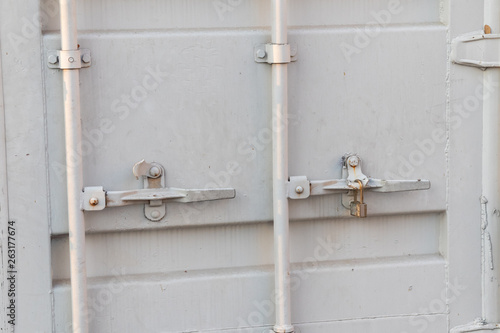 close up of door lock at container box wall